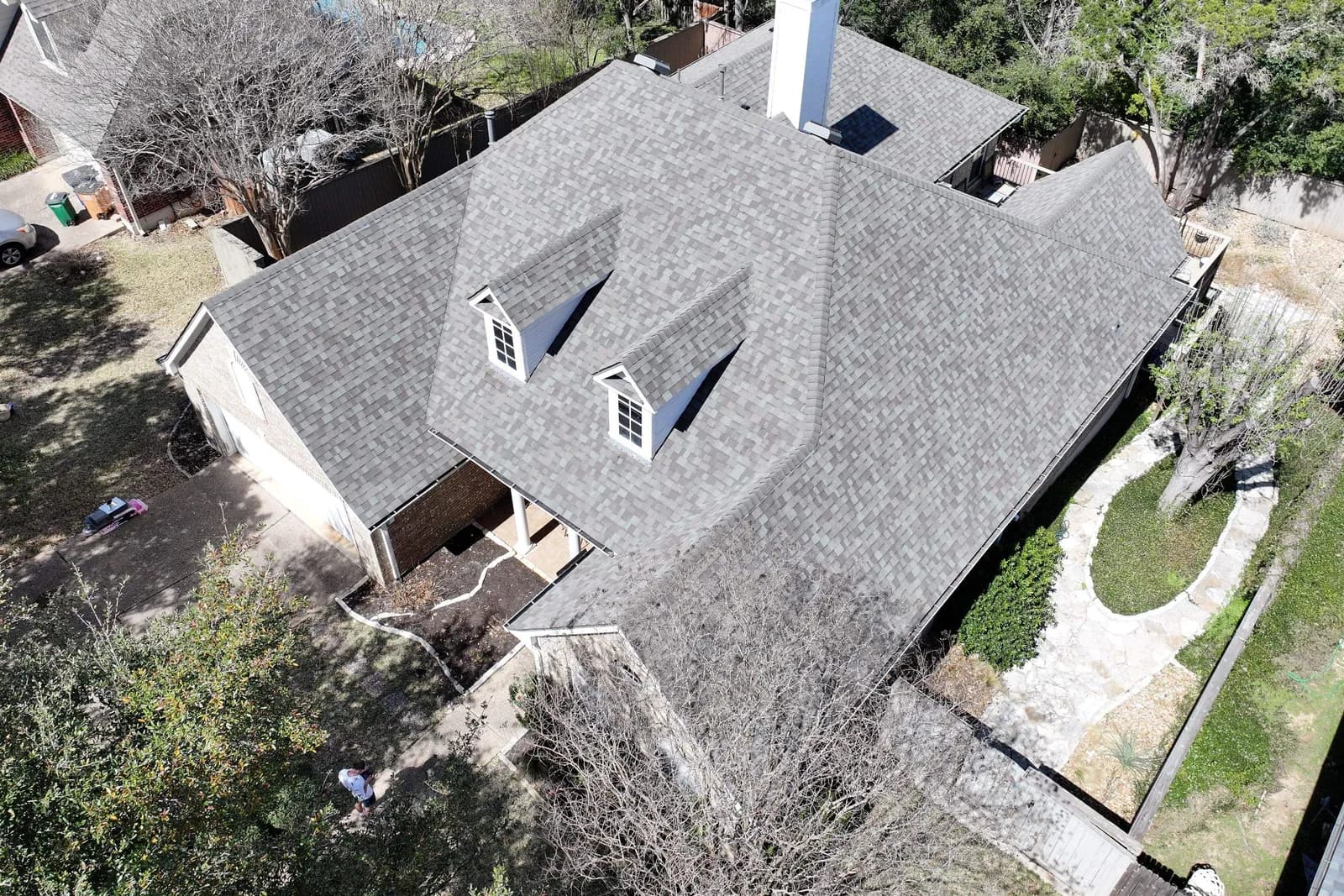 Aerial view of a finished architectural shingle roof in Austin