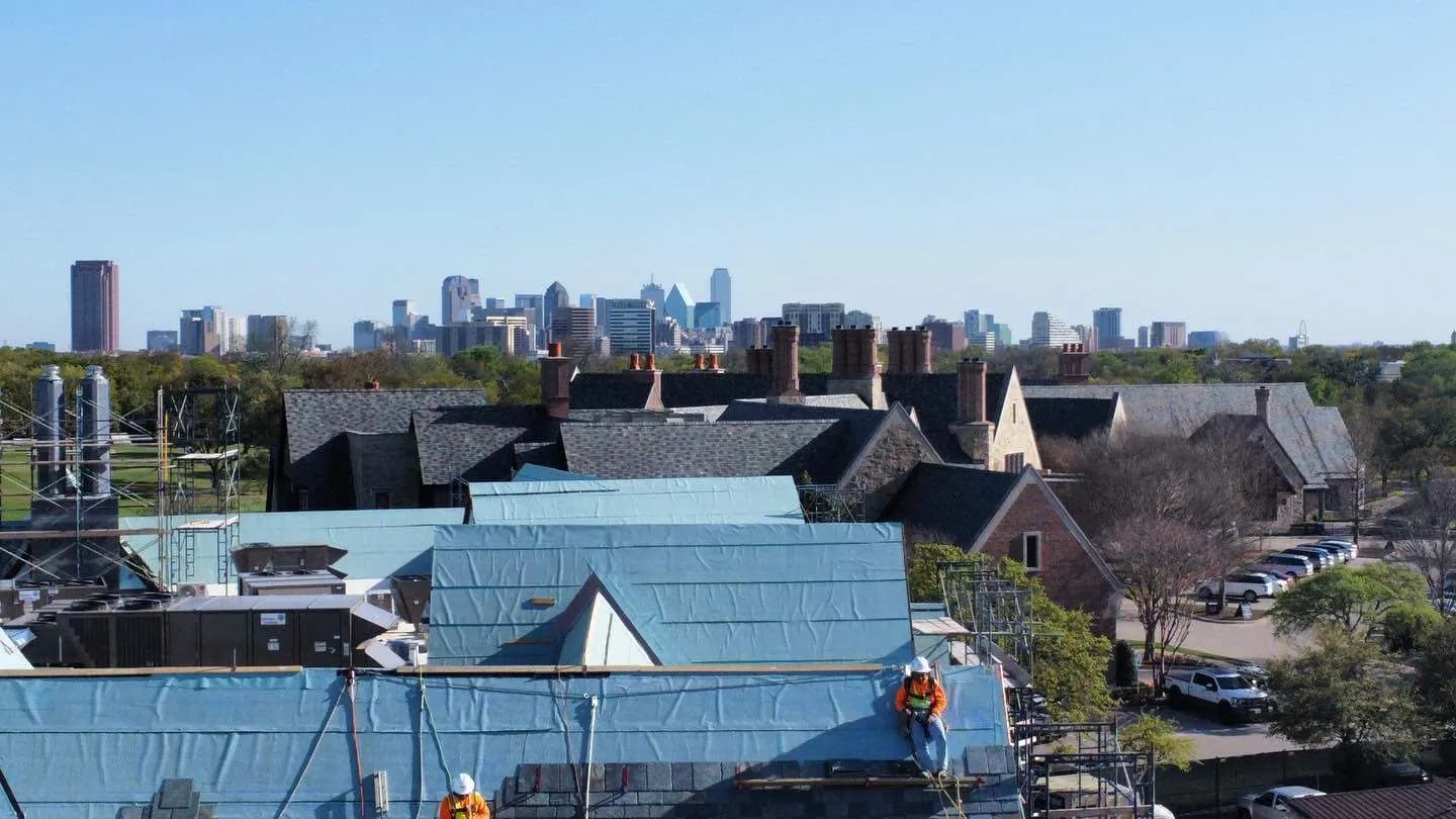 Drone view of slate roof installation on a Tudor-style landmark building