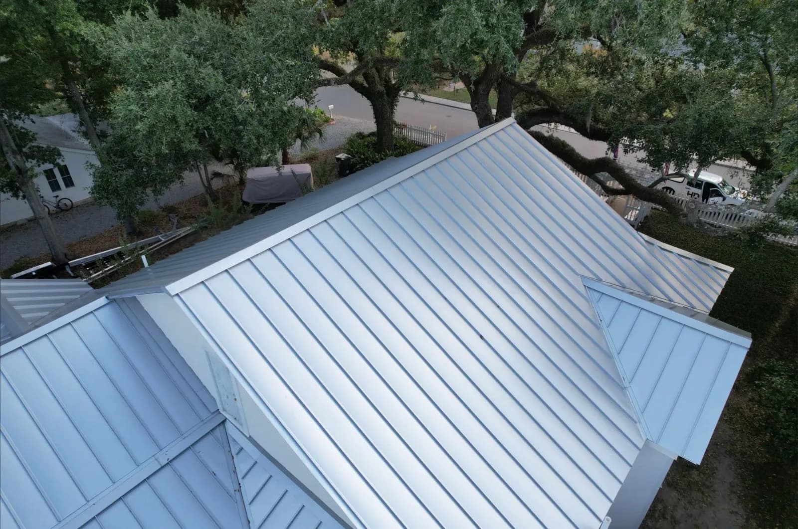 White standing-seam metal roof viewed from above