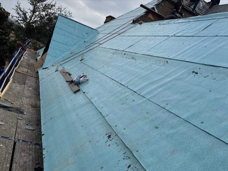 FORTIFIED roof installation showing sealed roof deck with peel-and-stick underlayment