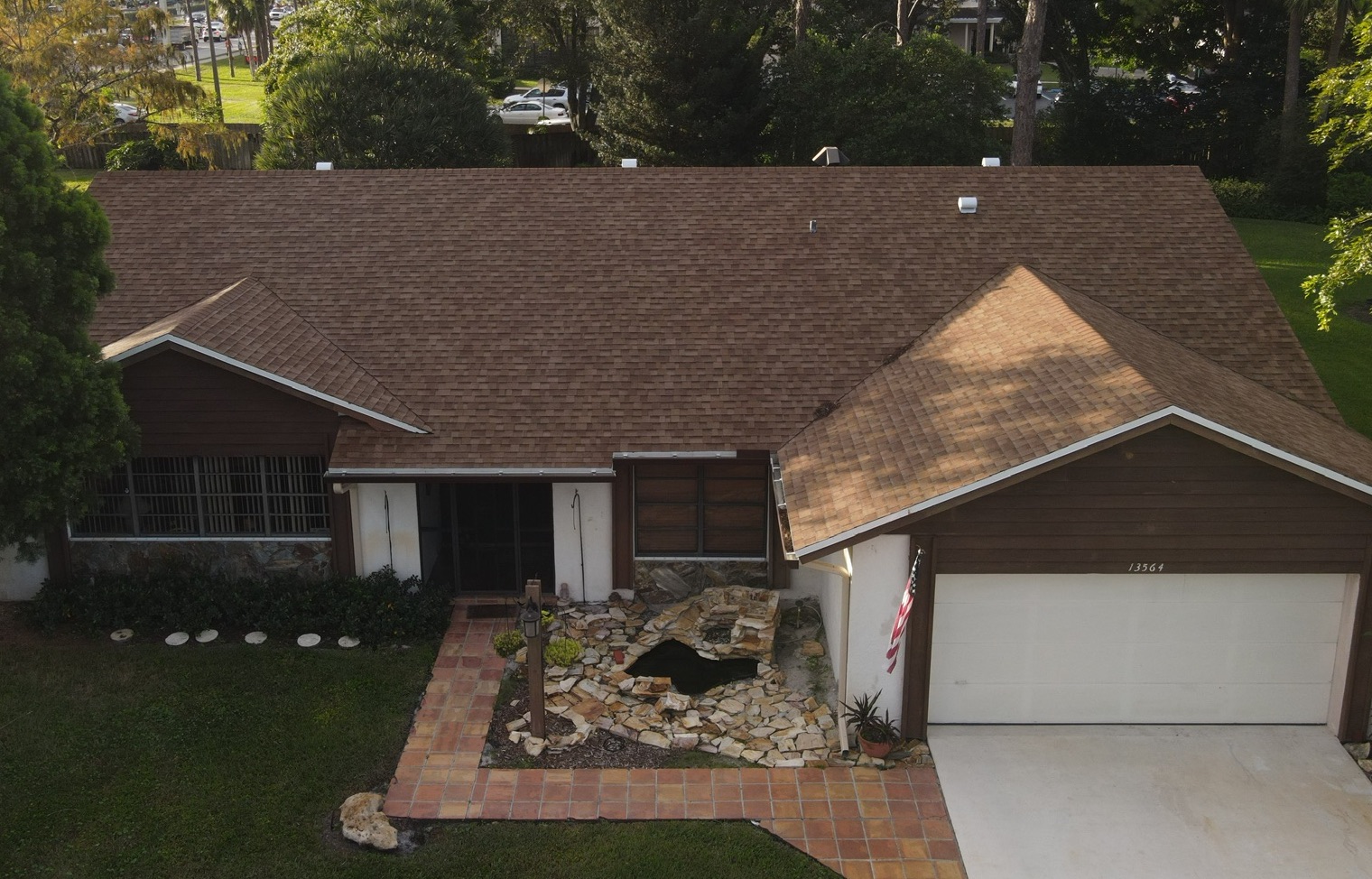 Experienced roofing team from Lapeyre Construction working on a Old Enfield roof