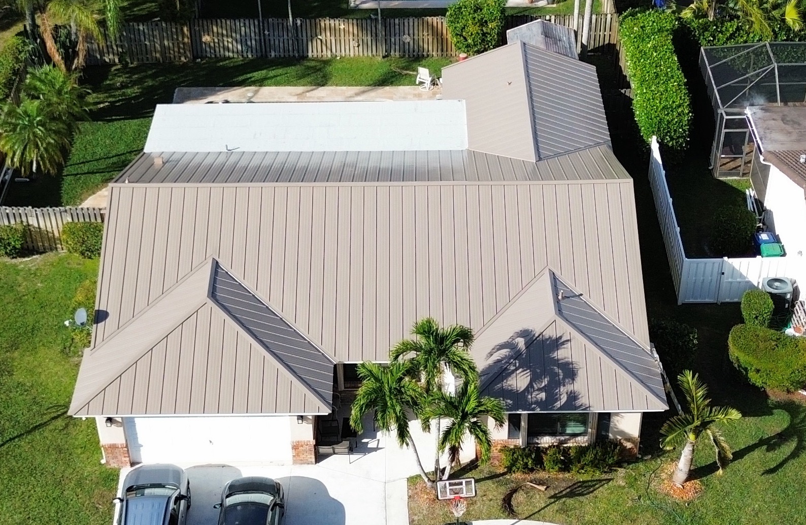 Experienced roofing team from Lapeyre Construction working on a Pemberton Heights roof