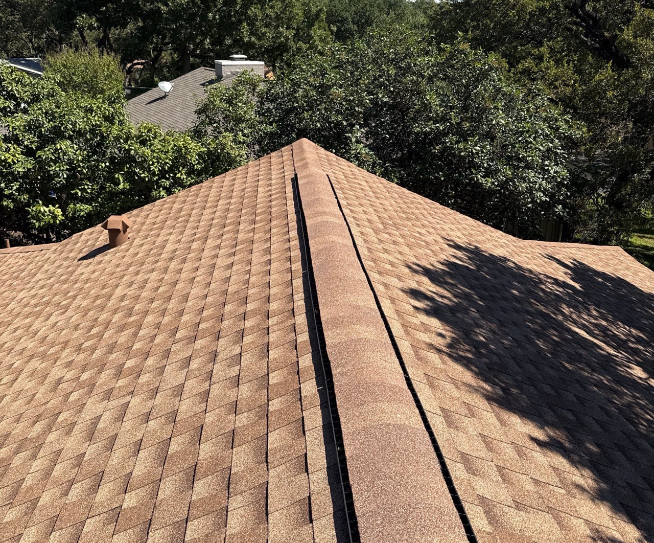 Roofer installing a residential roof in Texas.